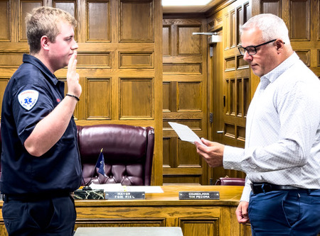 Bradford City Administrator Eric Taylor swore in Austin Coleman as the newest firefighter for the Bradford City Fire Department during Tuesday evening’s Bradford City Council meeting. Star photo by Daniella Langianese