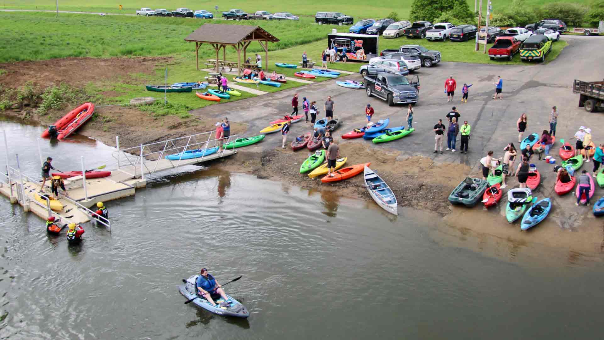 The put-in for Saturday's Float the Allegheny at Steam Valley Road in Portville was the starting point for about 100 participants in canoes and kayaks sponsored by the Greater Olean Area Chamber of Commerce. They floated a little under five miles to Franchot Park for an afterparty. (Rick Miller/Olean Star)