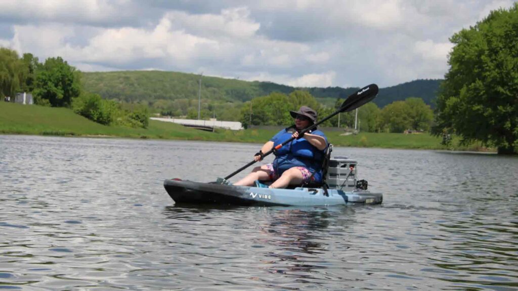 Shivon Vee of Olean paddles along Saturday during Float the Allegany sponsored by the Olean Area Chamber of Commerce. (Rick Miller/Olean Star)