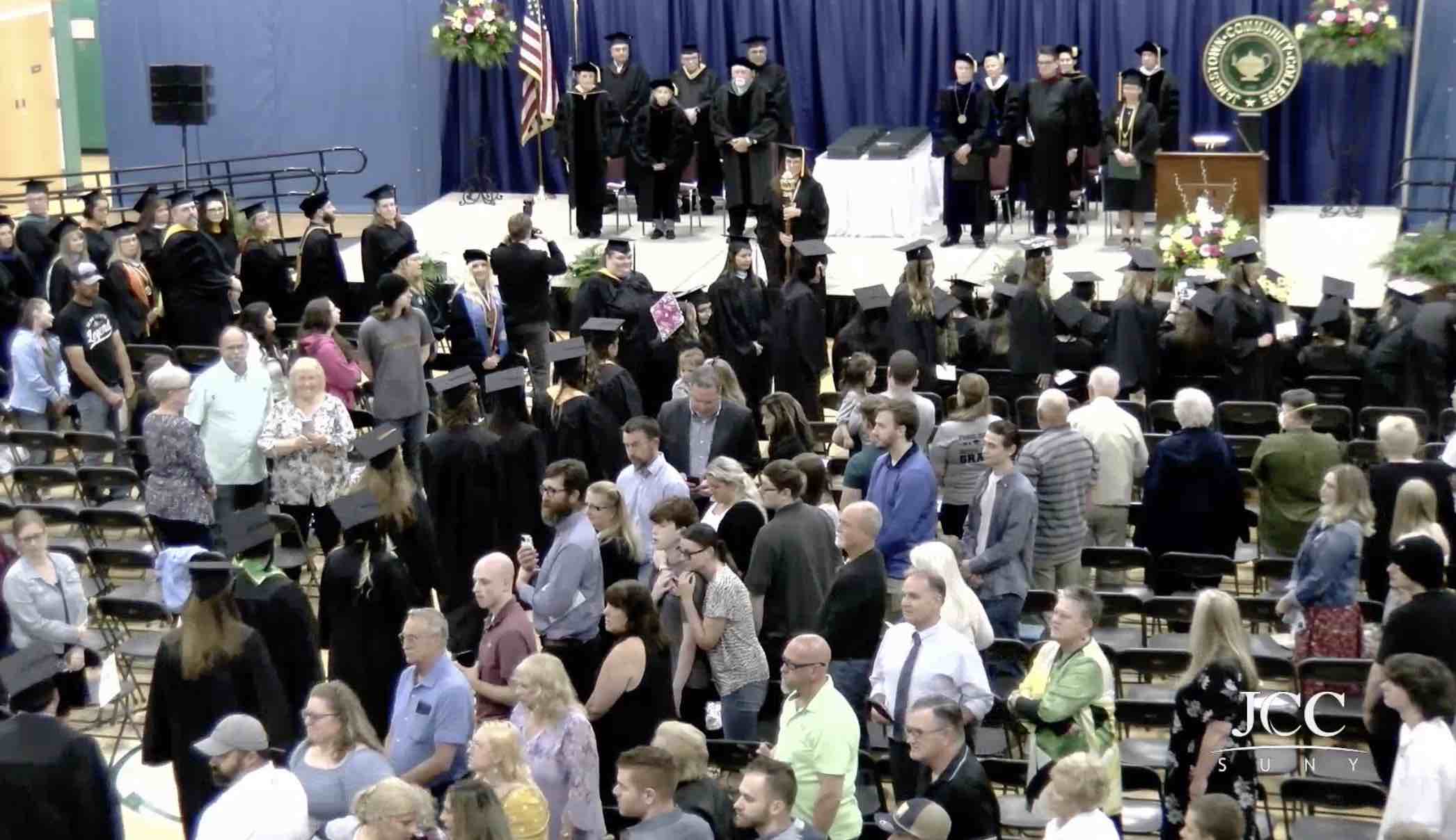 Jamestown Community College seniors march into their Commencement Ceremony at the Olean YMCA on Friday. (JCC Olean)