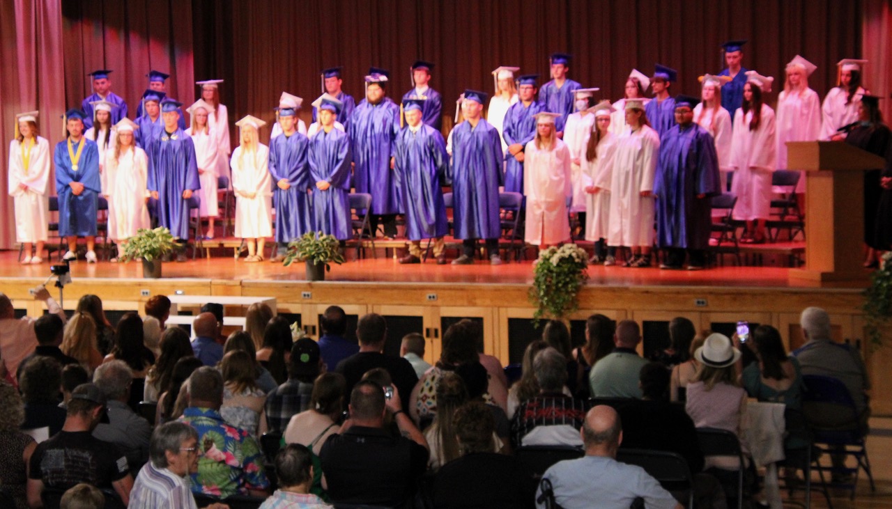(Rick Miller/Olean Star) Hinsdale Central School seniors on stage at commencement ceremonies Friday night.