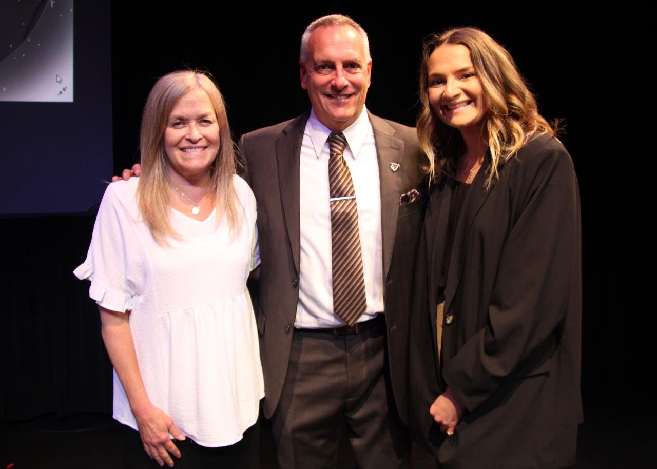 (Rick Mller/Olean Star) St. Bonaventure University’s new Vice President and Director of Intercollegiate Athletics Bob Beretta, a 1987 St. Bonaventure graduate, is flanked by his wife, Jennifer, also a 1987 alum, and daughter Julia following a press conference at the Regina Quick Arts Center Friday afternoon. His appointment was announced earlier this week.