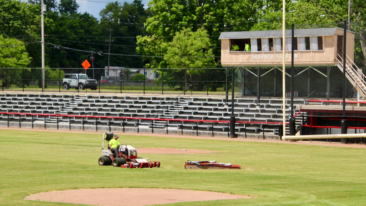 (Rick Miller/Olean Star) An Olean Parks and Recreation Department employee mows the grass at Bradner Stadium last month. The Olean Oilers will host a fireworks program at the stadium starting at 9:45 p.m., Thursday after a game with the Salamanca Lizards and a concert featuring New Wave Nation.