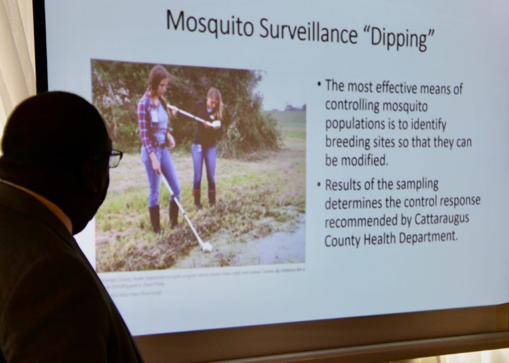 (Rick Miller/Olean Star)  Cattaraugus County Public Health Director Dr.Kevin D. Watkins updated the Board of Health Thursday on mosquito surveillance since aerial spraying in mid-June.