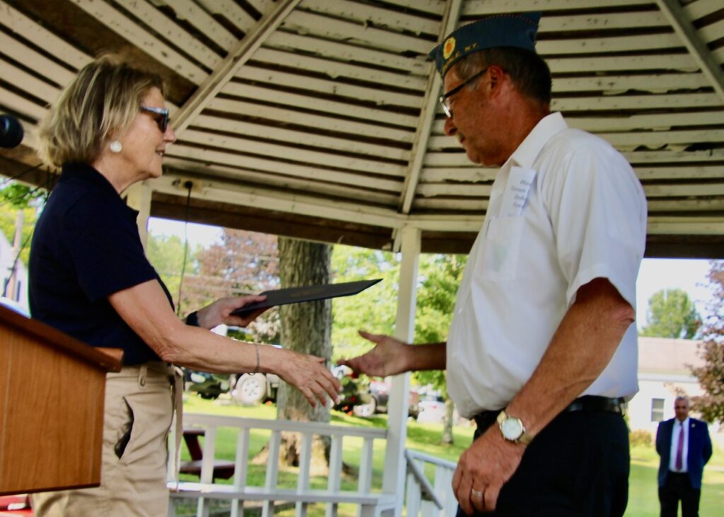 (Rick Miller/Olean Star)  Hinsdale Historical Society President Steve Clute (right), receives a proclamation on the dedication of the Hinsdale Vietnam Memorial by U.S. Rep. Nick Langworthy from his local aide Lee James.