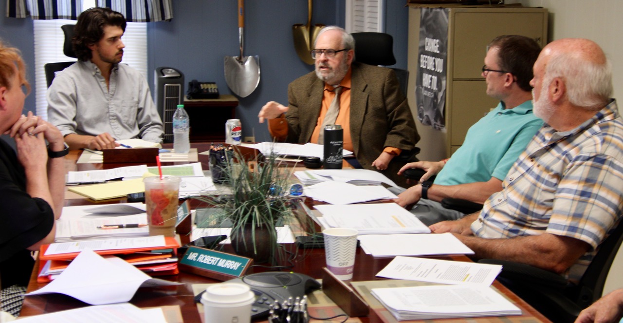 (Rick Miller/Olean Star) Dan Spitzer (third from right) of Hudson Russ, an attorney for Alle-Catt Wind Energy, speaks Tuesday at a meeting of the Cattaraugus County Industrial Development Agency where Alle-Catt was seeking tax incentives for its proposed 340-megawatt wind farm.