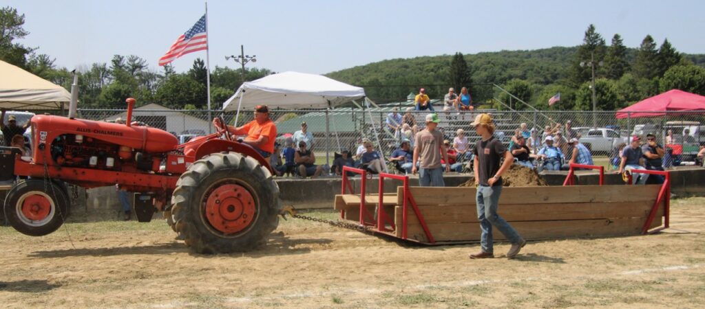 (Rick Miller/Olean Star) The weight of sand in the sled was too much for this Allis-Chalmers tractor at the Antique Tractor Pull at6 the 181st Cattaraugus County Fair in Little Valley Saturday.