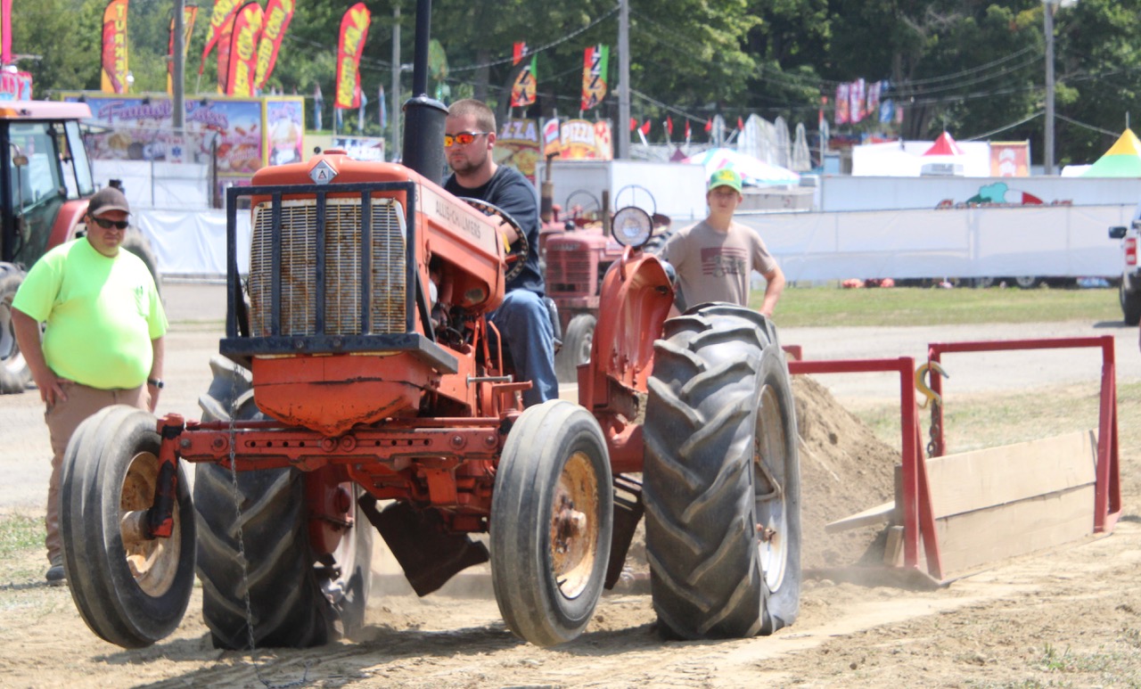 (Rick Miller/Olean Star) The front end of competitor’s tractor lifts off the ground in Saturday’s Antique Tractor Pull at the 181st Cattaraugus County Fair in Little Valley.