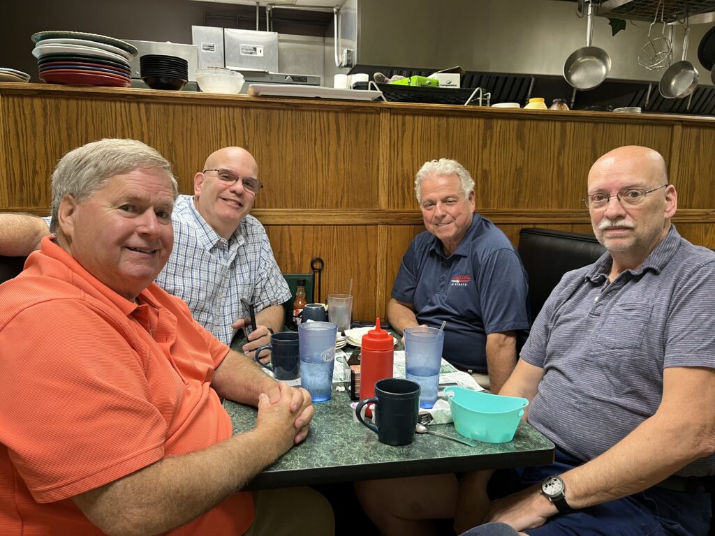 (Rick Miller/Olean Star) Republican U.S. Senate candidate Mike Sapraicone (second from right), met with Cattaraugus County GOP officials in Olean Friday. Others from left are Legislator Rick Smith of Olean; County Republican Chairman Mark Heberling and Legislator Steve Teachman of Olean.