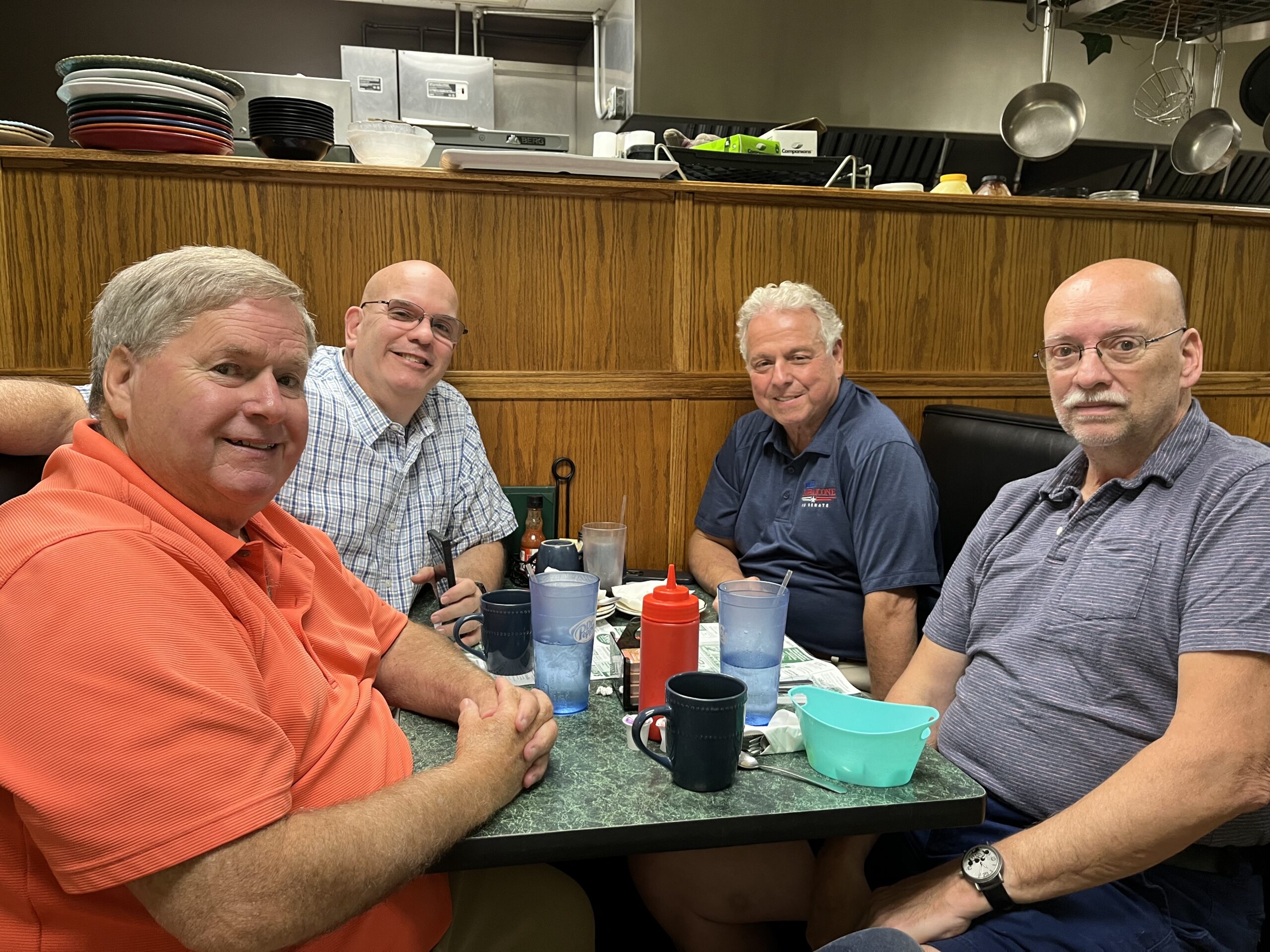 (Rick Miller/Olean Star) Republican U.S. Senate candidate Mike Sapraicone (second from right), met with Cattaraugus County GOP officials in Olean Friday. Others from left are Legislator Rick Smith of Olean; County Republican Chairman Mark Heberling and Legislator Steve Teachman of Olean.