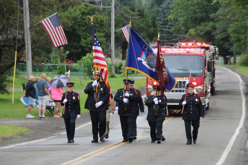 (Rick Miller/Olean Star)
Members of the West Valley Fire Department Honor Guard lead the Giant Parade for the Southwestern Association of Volunteer Firemen in West Valley on Aug. 3.