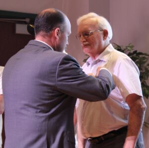 (Rick Miller/Olean Star) Al Ormand of Little Valley was pinned Wednesday by Rep. Nick Langworthy for his Vietnam-era service.