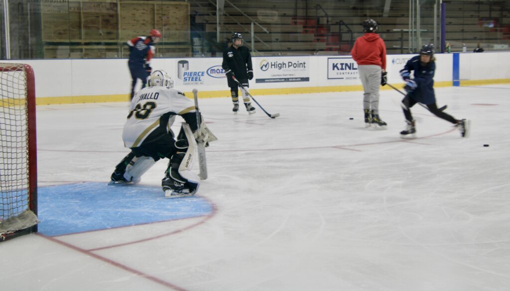 (Rick Miller/Olean Star)
Goalie Dominic Cavallo of Allegany tries to stop a shot on goal during the first day of skate and shoot of the 2024-25 skating season at the ice rink in the William O. Smith Recreation Center in Olean.