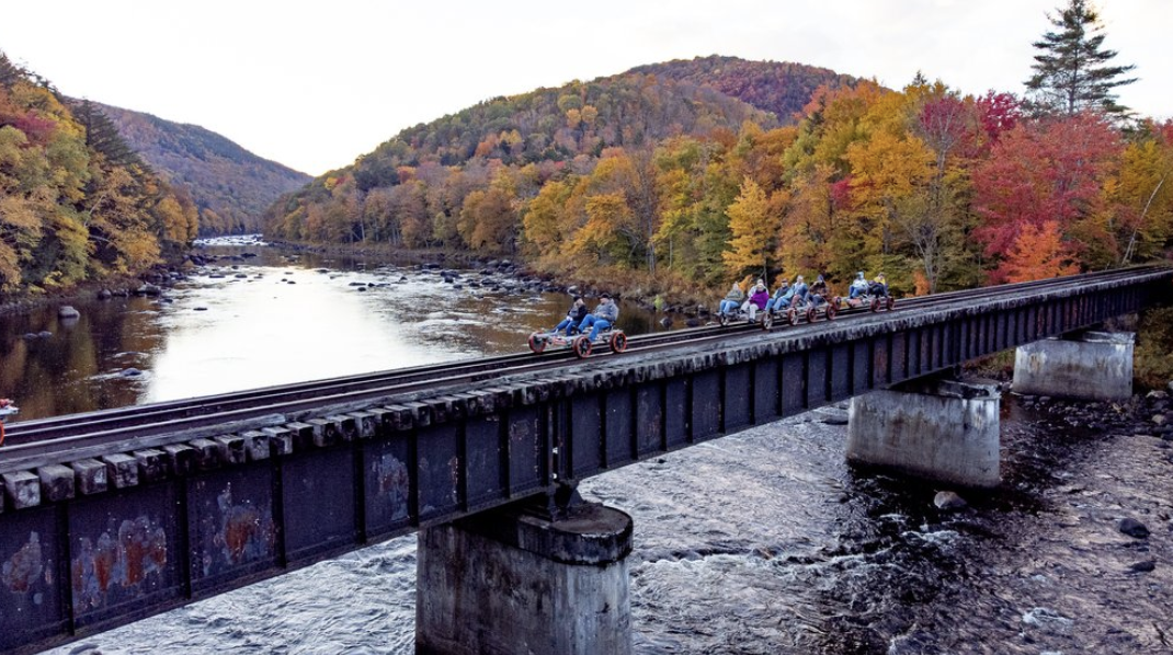 (Revolution Rail photo) Revolution Rail, which operates several rail bike excursions in New York state including this one at North Creek that follows the Hudson River, is coming to the Village of Cattaraugus this fall.