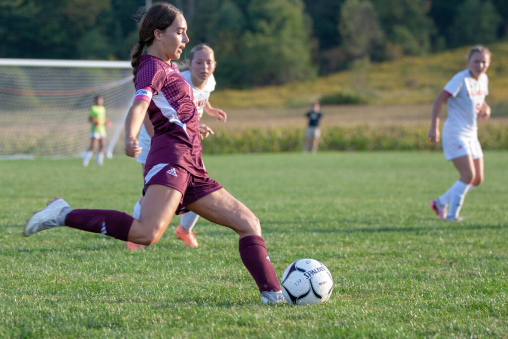 Ellicottville's Addie John sends a pass across field vs Salamanca 9-19-24 (Photo: Bob Crandall)