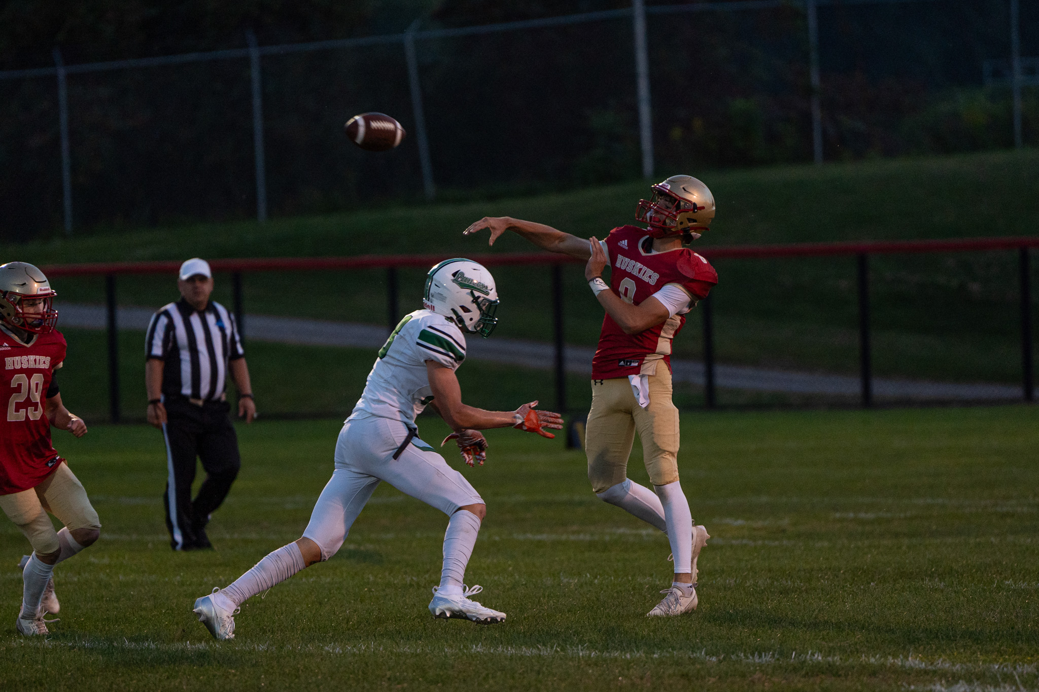 Photo by Hunter O. Lyle Olean’s Austin Miles wraps up Lewiston Porter’s Jackson Courts during the Huskies’ 29-7 win on Friday.