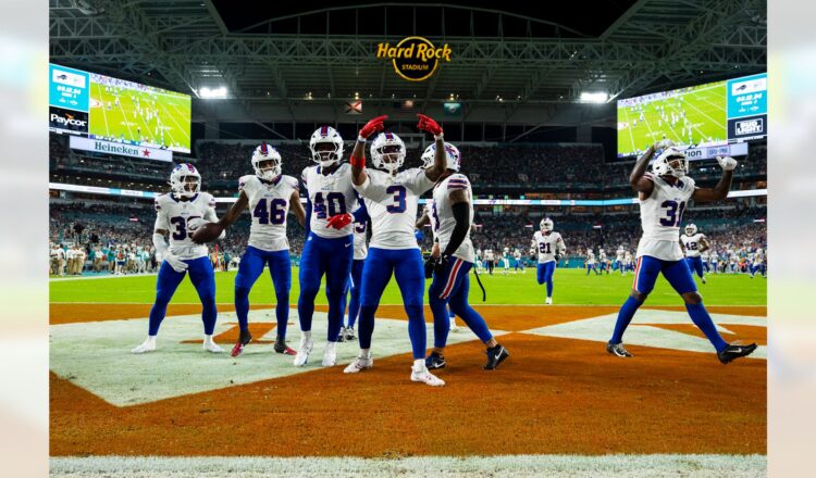 Photo: The Bills defense celebrates another turnover against Miami. Photo by Ben Green/Buffalo Bills