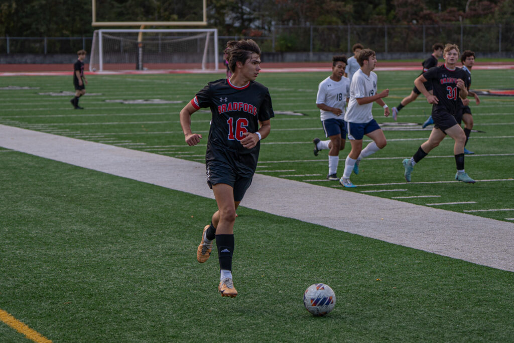 Photo by Hunter O. Lyle  Bradford’s Gabe Tate takes the ball downfield during the Owls’ 7-0 win over Oil City on Senior Night. 