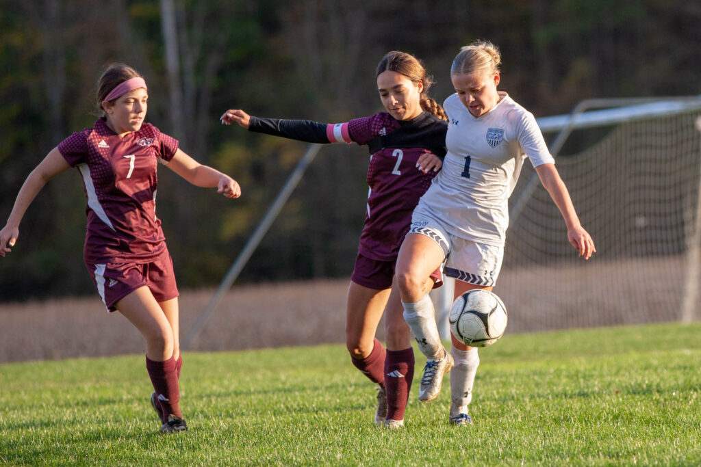 Photo by Bob Crandall  Addie John battles for possession against Catt-Little’s Makenzie Harvey during the Lady Eagles' 7-0 win. John ended with two goals and an assist. 