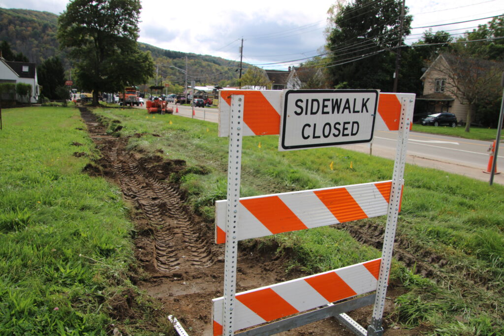 (Rick Miller/Olean Star)  This sidewalk closed sign went up on the east side of South Union Street Wednesday to begin work on Walkable Olean IV.