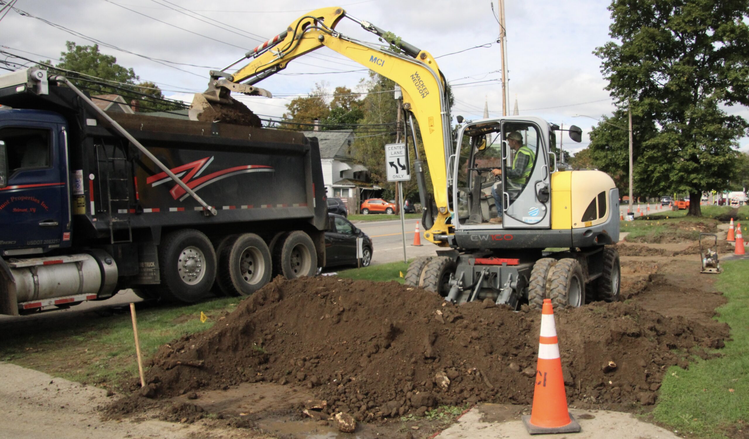(Rick Miller/Olean Star) A Millennium Construction crew prepares a path for a wider sidewalk on the east side of South Union Street between Greene Street and Franchot Avenue Wednesday.