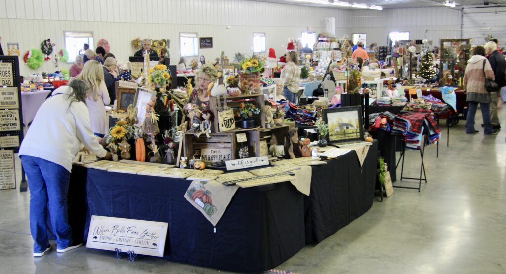 (Rick Miller/Olean Star)
Visitors browse merchandise at the W.I.L.M.A. Wooly Bear Weekend at the Cattaraugus County Fairgrounds over the weekend. Nearly 50 vendors offered hand-crafted merchandise for sale.