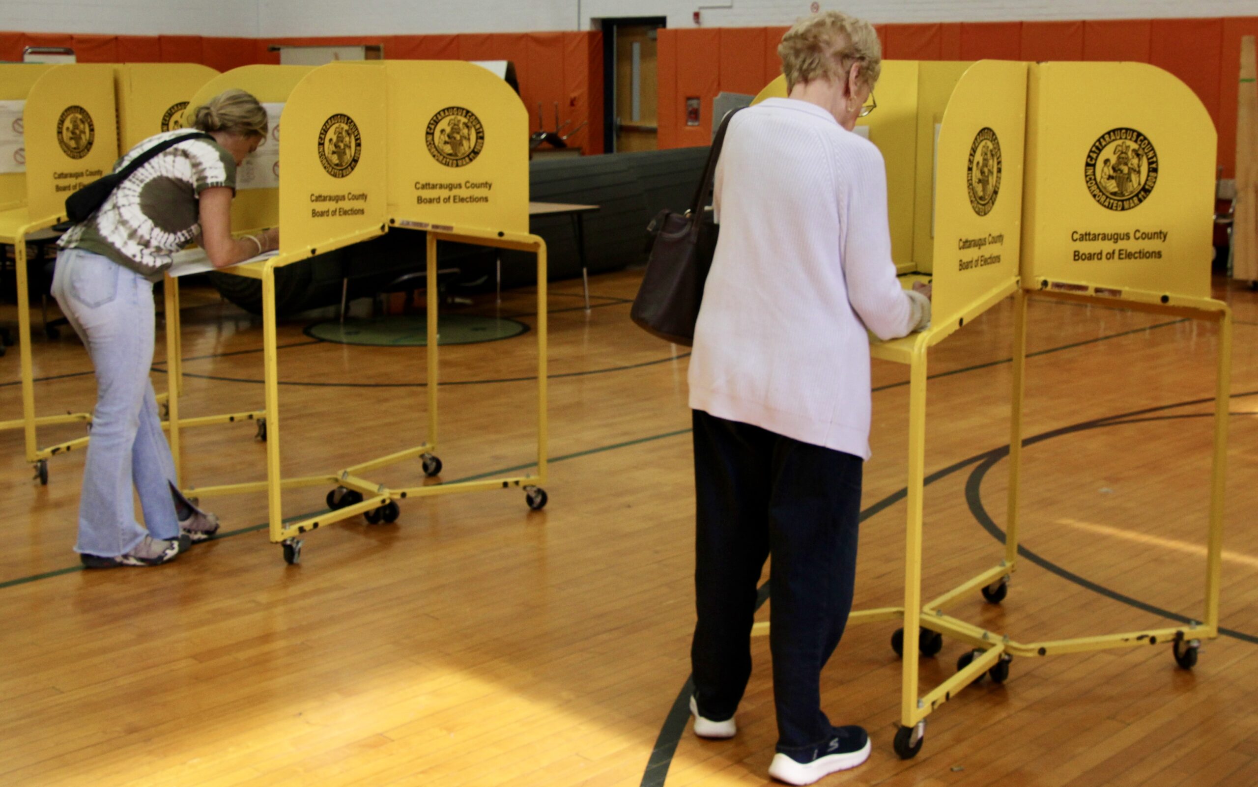 (Rick Miller/Olean Star) Voters participate in early voting Thursday in the gymnasium in the former elementary school, in Little Valley.