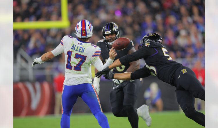 (PHOTO: Josh Allen hit in the right hand by linebacker Kyle Van Noy hit his right hand, jarring the ball loose Kyle Hamilton recovered. Shawn Hubbard/Baltimore Ravens)