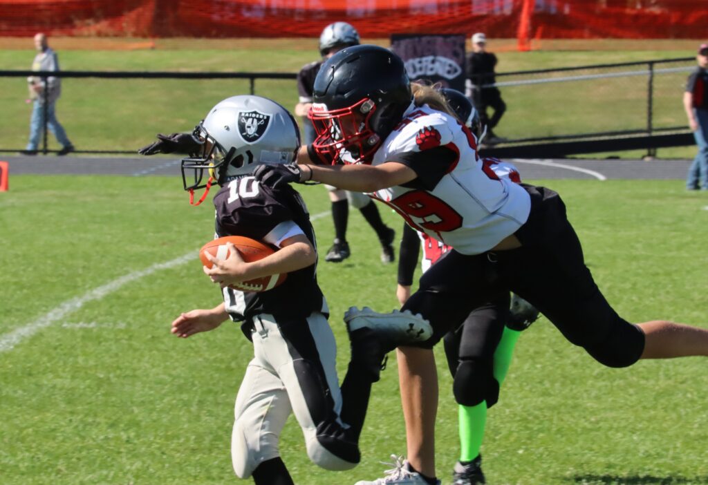 Photo-Char-Stone-Melina-Hall-brings-down-a-Raider-ball-carrier-in-Wolverines-15-12-win-to-advance-to-Super-Bowl