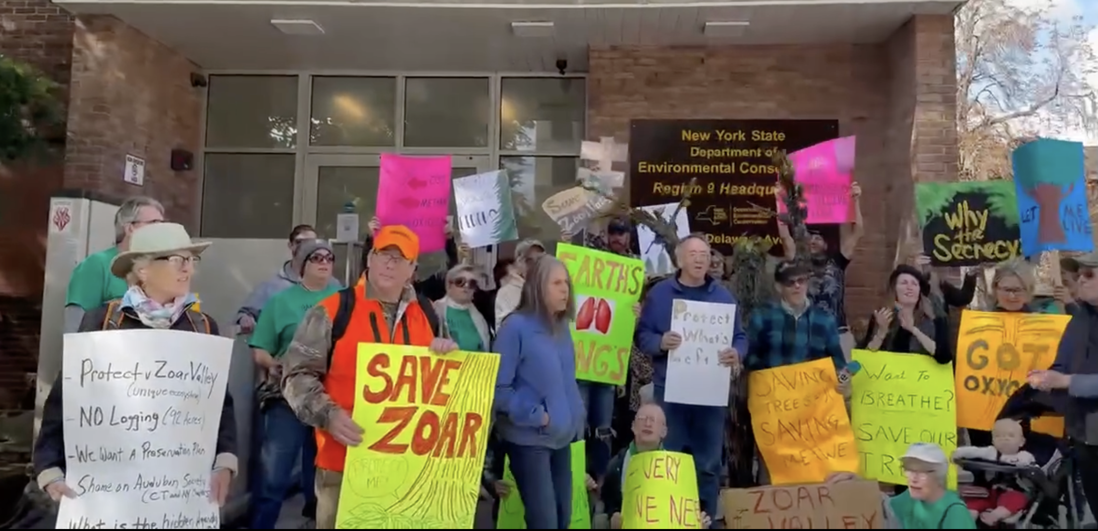 (Photo provided) Members of the Zoar Valley Coalition protest plans to log parts of Zoar Valley outside the state Department of Environmental Conservation headquarters in Buffalo Tuesday.