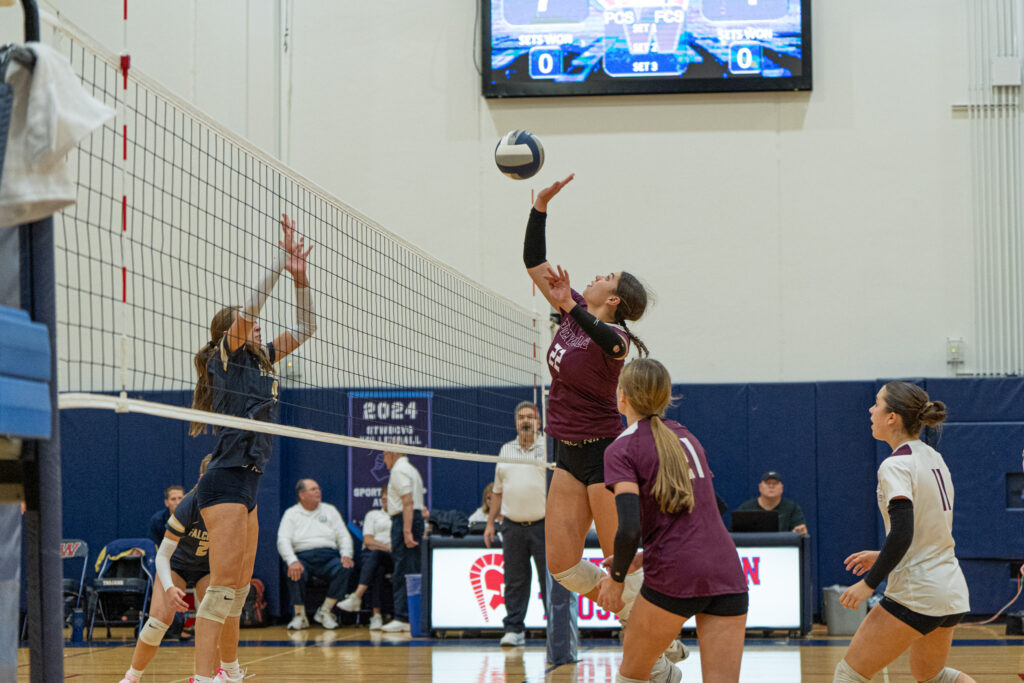 Addi Haynes rises up for a slam during the Lady Panthers 3-0 win over Falconer in the Section VI Class C championship. | Photo by Hunter O. Lyle
