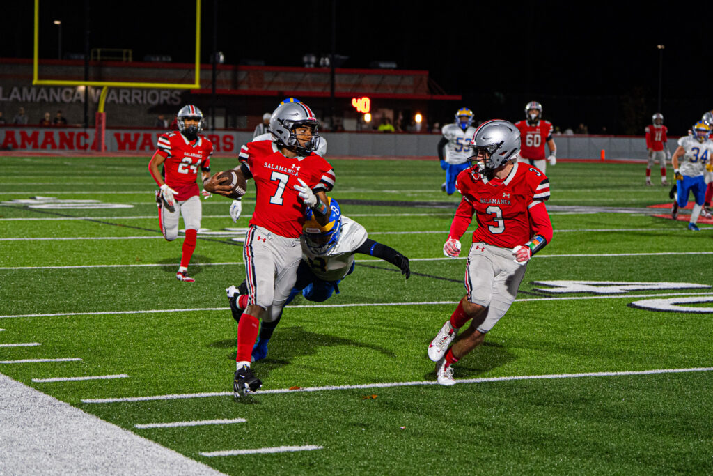 Salamanca's Xavier Peters takes the ball down the sideline during the Warriors' 49-12 win over Cleveland Hills. Peters ended with 149 rushing yards and a touchdown in the win. | Photo by Hunter O. Lyle