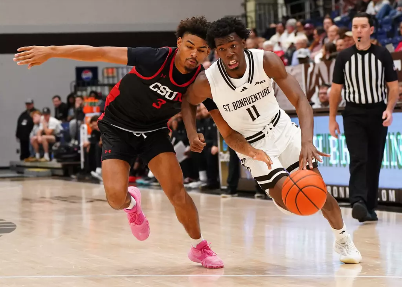 St. Bonaventure guard Melvin Council Jr. dribbles through contact during the Bonnies' season-opening win over Cal State Northridge on Monday. | St. Bonaventure athletics/Craig Melvin