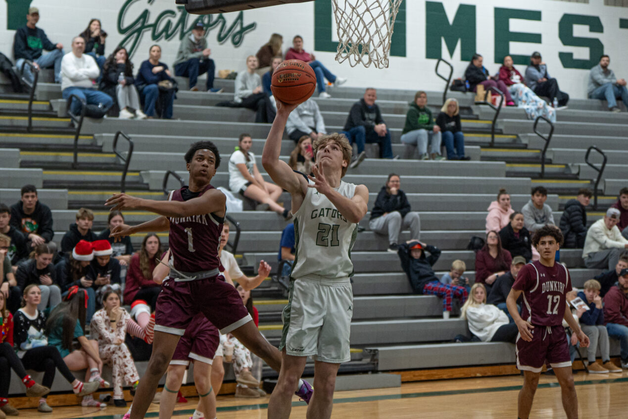 Gavin Straub gets a clean look at the rim during the Gators’ fourth consecutive win to start the season. Straub recorded a double-double with 13 points and 10 rebounds. | Photo by Hunter O. Lyle