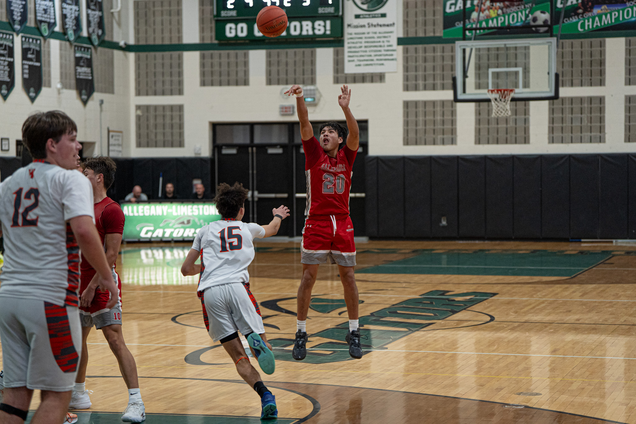 Salamanca's Avery Brown takes a contested jumper during the Warriors' 66-65 loss to Wellsville. Brown scored a team-high 20 points, earning the Player of the Game award. | Photo by Hunter O. Lyle