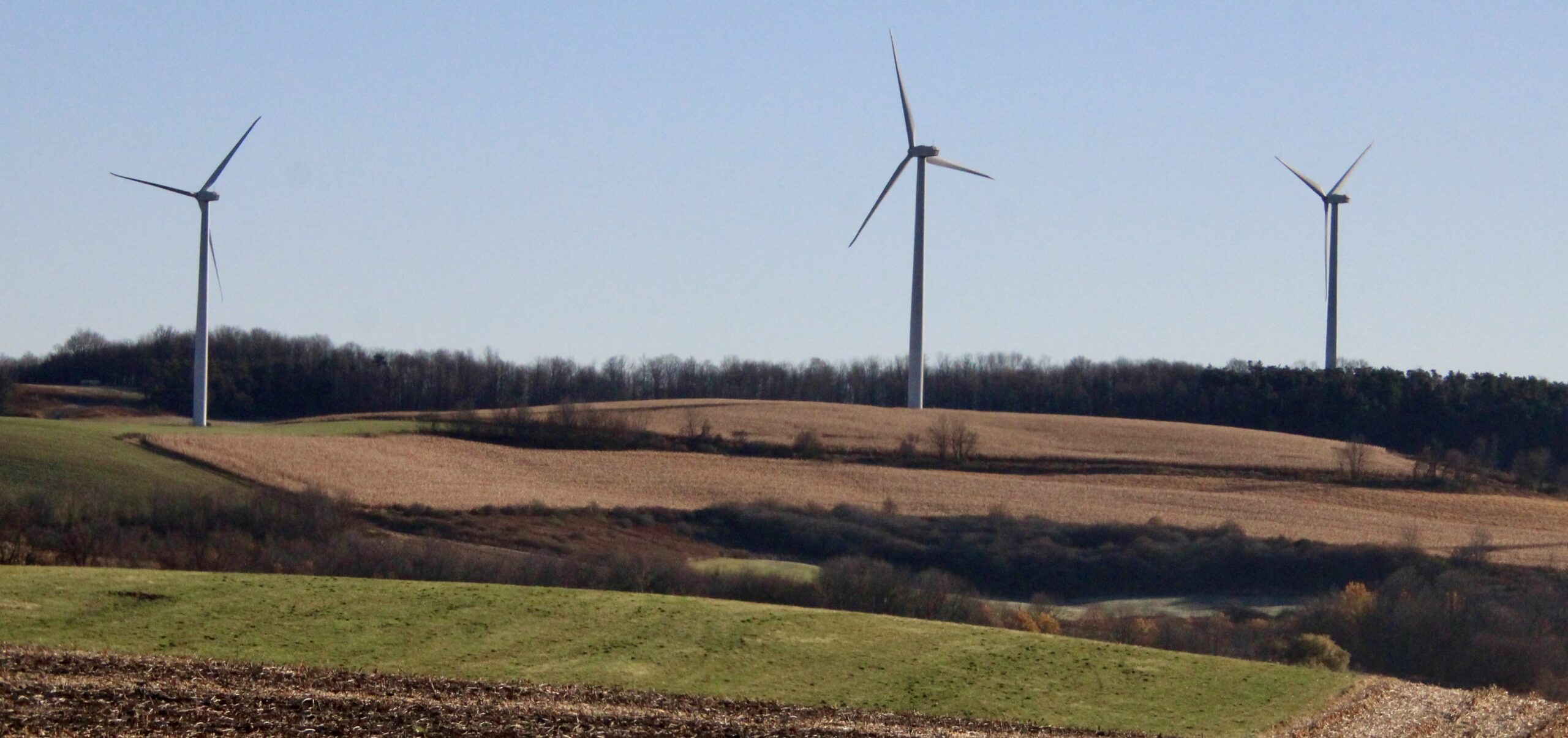 (Rick Miller/Olean Star) Wind turbines spin at a wind farm in Madison County in Central New York, near Munnsville.