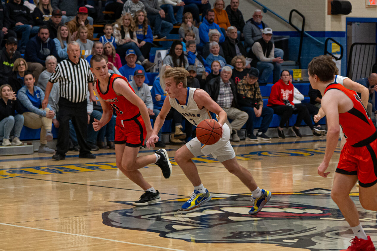 Landon Francis strips a pass and sparks a fast break during their win over the Hubbers in the opening day of the Randy Stebbins Memorial Tournament. | Photo by Hunter O. Lyle