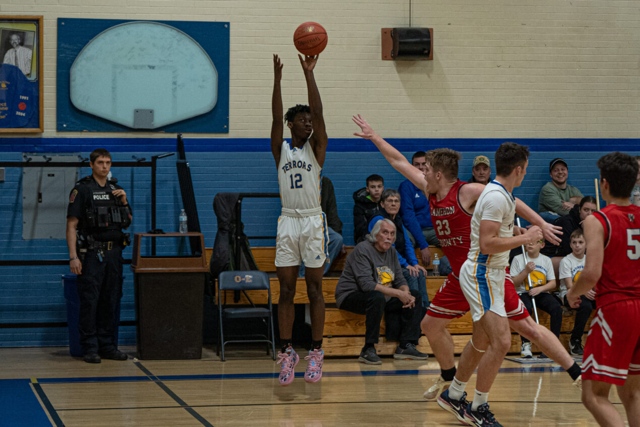 Shene Thomas takes and makes a triple for the Terrors during their 61-50 win over the Red Raiders. | Photo by Hunter O. Lyle