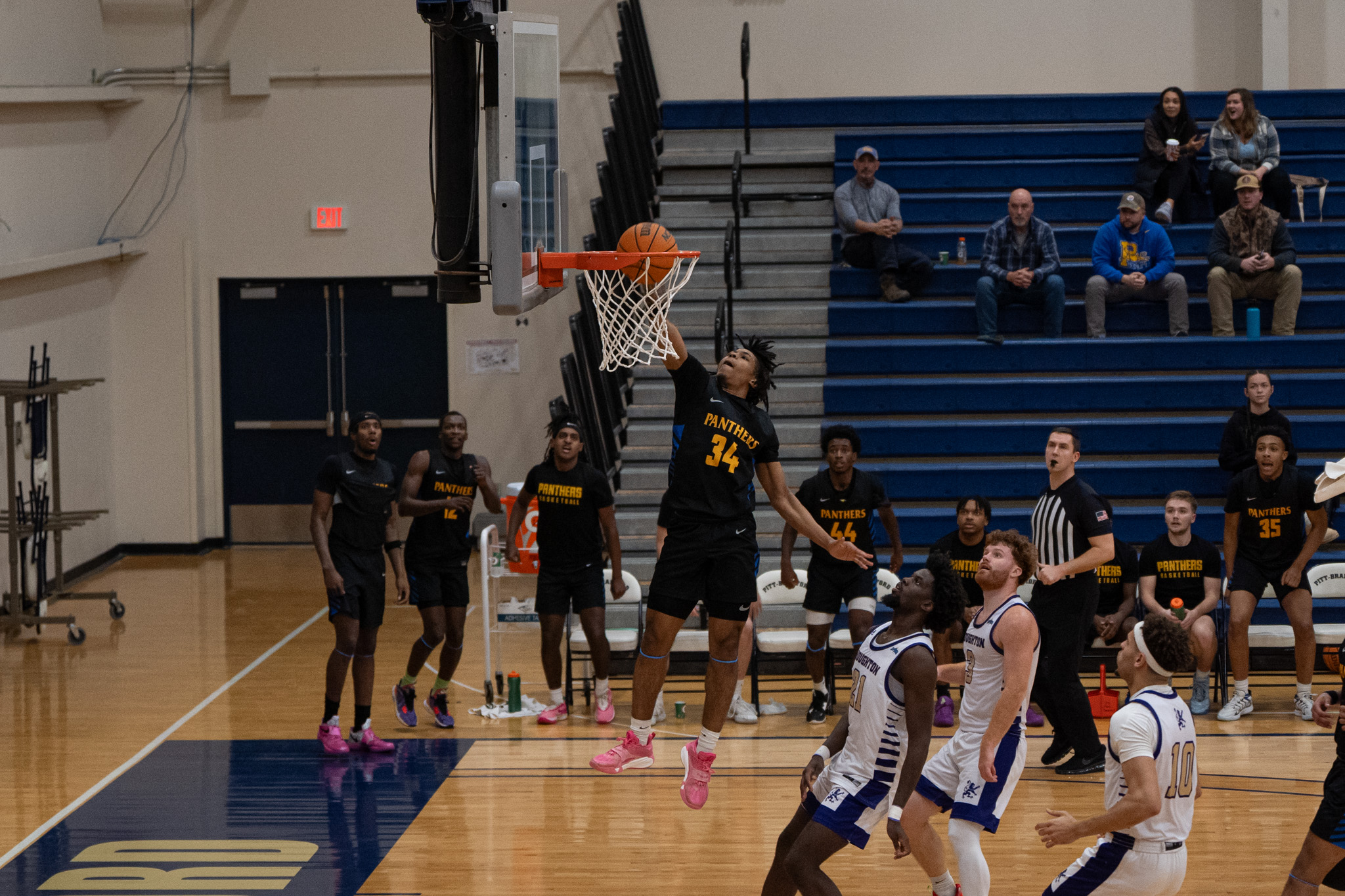 Pitt-Bradford’s Braylen Salters flushes down a slam dunk during the Panthers’ 120-87 win over Houghton on Tuesday, Dec. 10. Recently, Salters was named AMCC Player of the Week. | File photo by Hunter O. Lyle