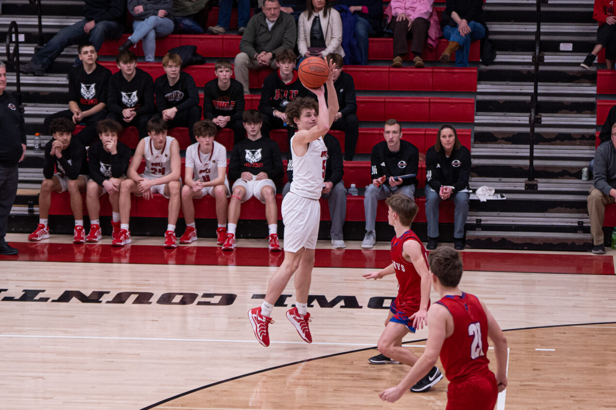 Tyler Simmons shoots from beyond the arc during the Owls' 54-44 loss to St. Marys. | Photo by Hunter O. Lyle