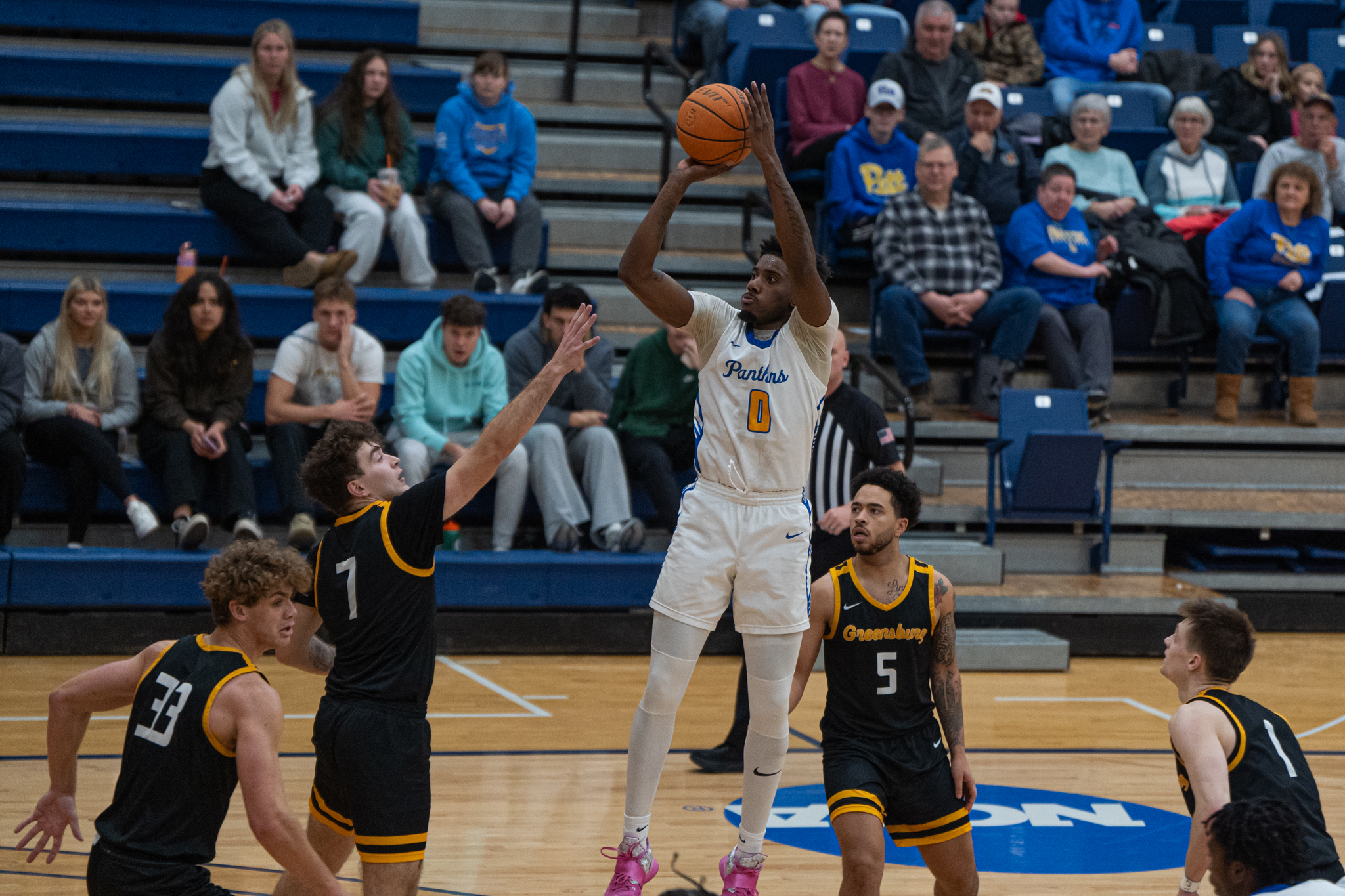Pitt-Bradford's Jamarion Butler pulls up for a contested jump shot during the Panthers' 98-93 win over Pitt-Greensburg. Butler finished with 31 points and 12 rebounds in the win. | File photo by Hunter O. Lyle