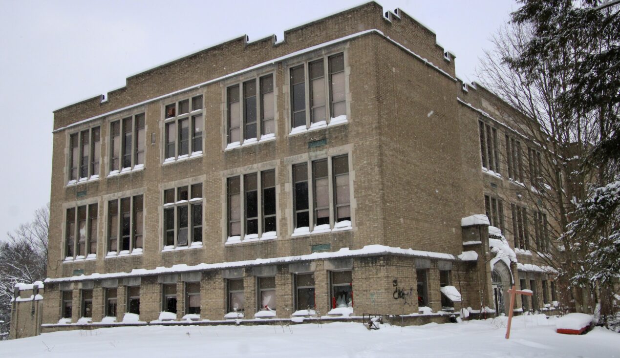 (Rick Miller/Olean Star) The three-story former Cattaraugus Elementary School, 51 Washington St., Cattaraugus, was the target of an arsonist Tuesday. Firefighters from Cattaraugus and six other communities responded to the mutual aid fire.
