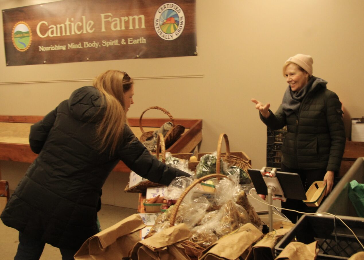 (Rick MIller/Olean Star)
Shauna Keesler of Cuba (left) shops at the Canticle Farm table at the winter Olean Farmers Market at Canticle Farm's Market in Allegany on Saturday. Olean Farmers Market vendors will be there every other Saturday for the next two months.