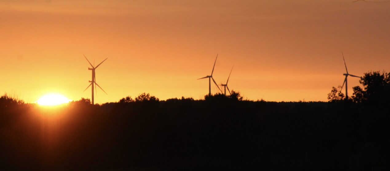 (Rick Miller/Olean Star) Arkwright wind turbines in northern Chautauqua County are backlit by a setting sun in this photo taken from the western Cattaraugus County town of Conewango.