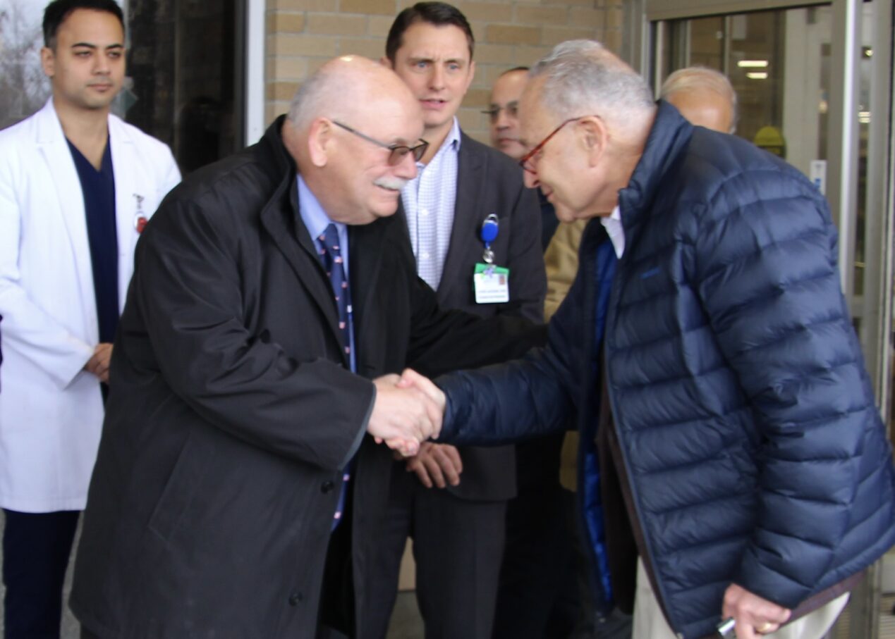 (Rick Miller/Olean Star) Olean Mayor Bill Aiello (left) greets then Senate Majority Leader Charles Schumer outside Olean General Hospital on Veterans Day where the senator held a press conference. On Monday, Schumer announced a $25 million grant for Olean to reconstruct West State Street.