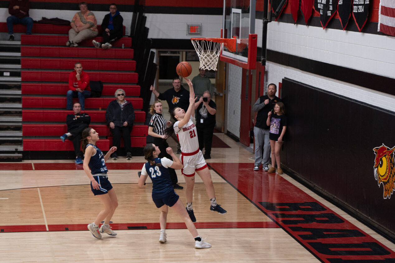 Mackenzie Taylor steals the ball and takes it the full length of the court for two points during Bradford's loss to the Lady Raiders. | Photo by Hunter O. Lyle