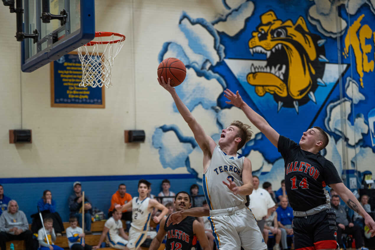 Landon Francis stretches out for a layup during the Terrors' Senior Night win over Galeton. Franics would lead the charge with 28 points. | Photo by Hunter O. Lyle