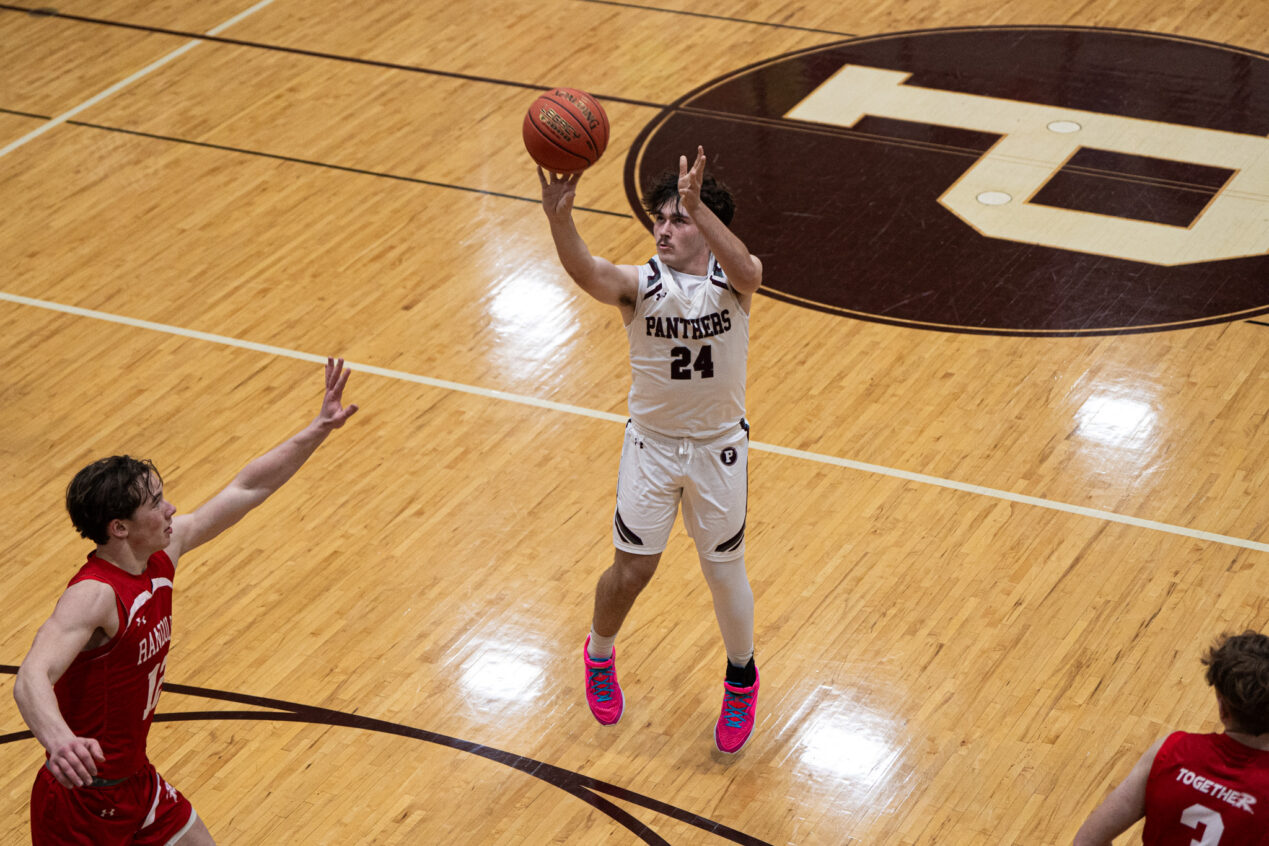 Zach Green takes a shot from beyond the arc during Portville's loss to Randolph on Monday. | Photo by Hunter O. Lyle