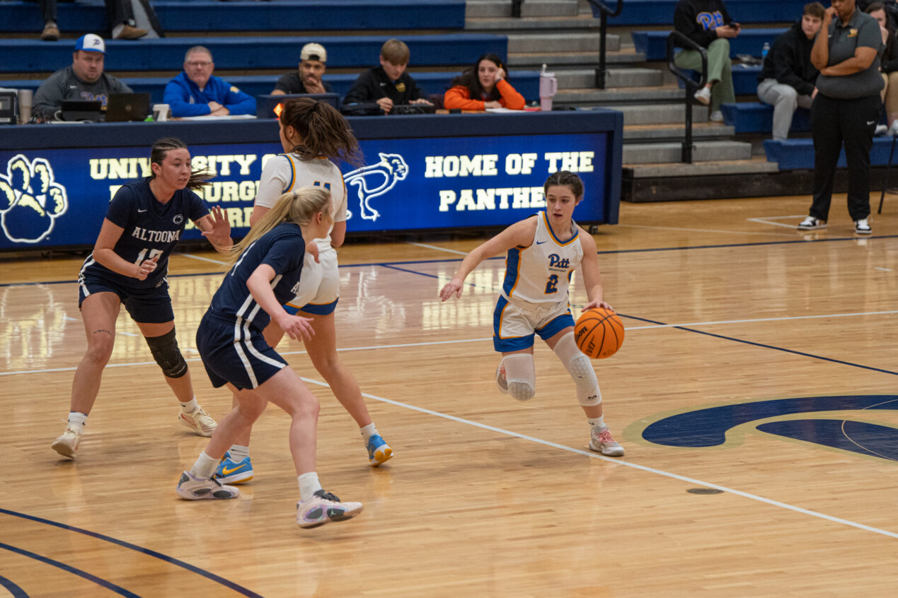Avery Benzel (2) gets a screen from Paige Gratto during the Lady Panthers' loss on Wednesday. Benzel finished with 12 points, seven rebounds and three steals. | Photo by Hunter O. Lyle
