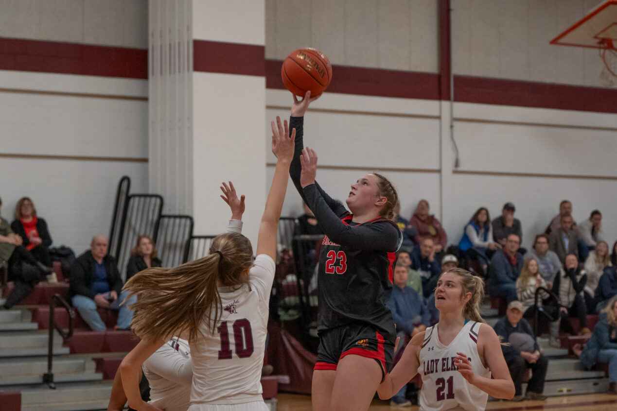 Bradford's Hayley Keane takes a contested floater during the Lady Owls' season-opening loss to Ridgway on Tuesday, Dec. 3. Recently, Keane dropped 17 points and 20 rebounds in the championship game of the Kane Holiday Tournament. | Photo by Hunter O. Lyle